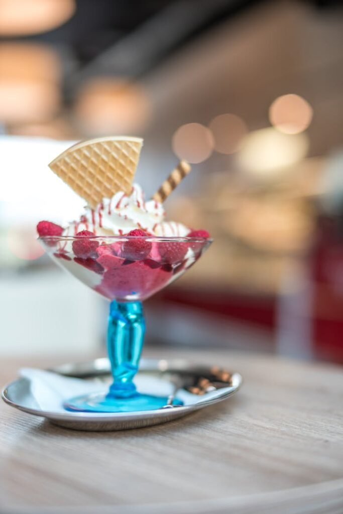 Selective Focus Photography of Strawberry Ice Cream With Cookie