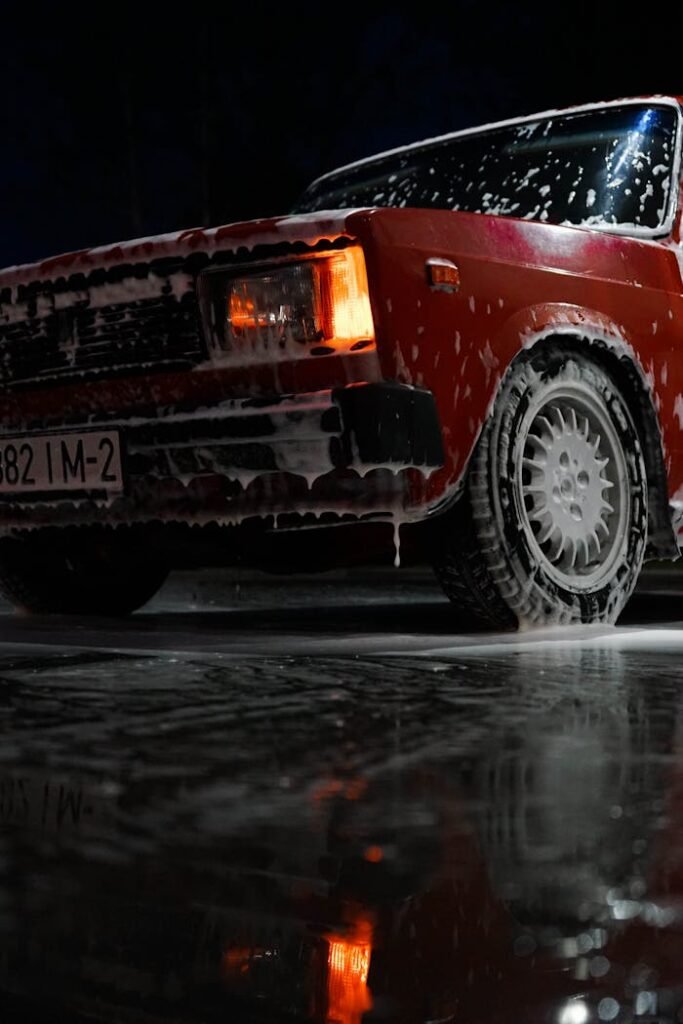 Red Car Soaked With Soap